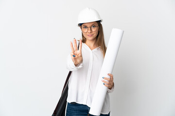 Young Lithuanian architect woman with helmet and holding blueprints isolated on white background happy and counting three with fingers