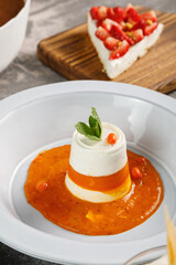 The pana cotta cake with sauce on plate