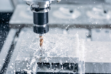Obraz na płótnie Canvas Process working CNC turning cutting milling metal Industry machine iron tools with splash water
