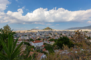 Fototapeta na wymiar Lycabettus Hill from the Plaka old district in Athens, Greece