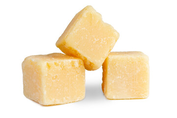 Parmesan grana padano cheese cubes isolated on white .