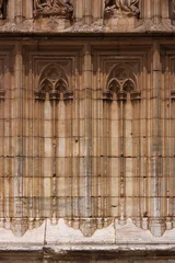 Foto op Aluminium Blind tracery arcade with lancet arches at the gothic chuch in the old town of Castello d’Empuries, Catalonia in Spain © float