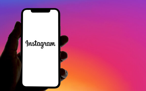 Instagram Logo Is Displayed On A Smartphone, With The Color Gradient Of The Instagram Logo In The Background, Social Media, Lifestyle, 2024