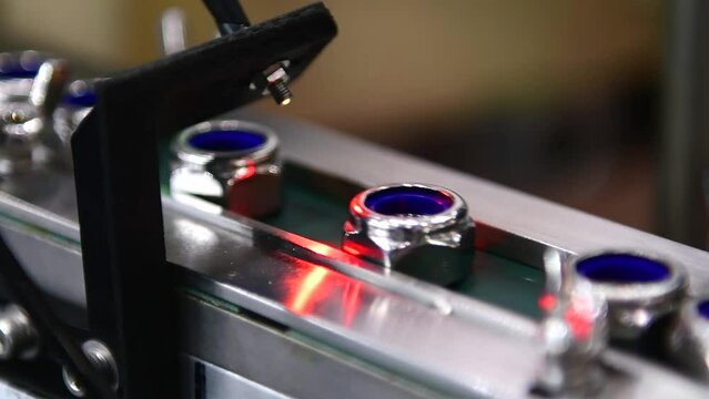Automatic vision system for inspection nuts in product line industrial