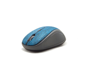 Beautifully shaped blue computer mouse with a modern and ergonomic design and ergonomics as a wireless mouse on a separate white background.