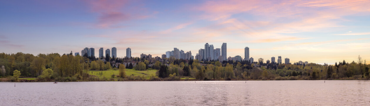 Scenic view of a modern city park by the lake. Spring Season. Deer Lake, Burnaby, Vancouver, British Columbia, Canada. Panorama. Sunset Sky Art Render