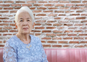 Elderly asian women Sleeping alone in the house alone