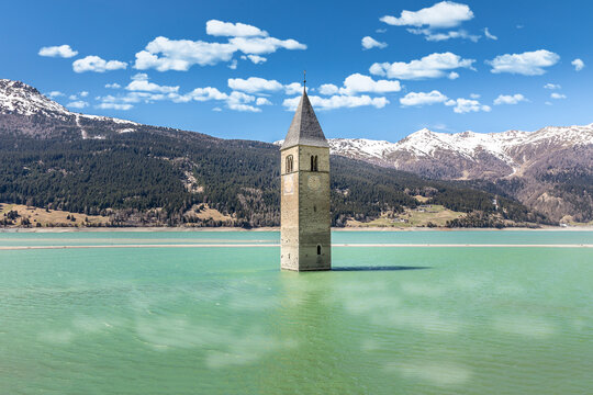 The famous bell. tower in the Lake Reschen, Passo di Resio, Italy