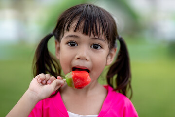 Cute Toddler Girl Eating Ice-Cream