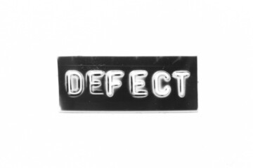 Black color banner that have embossed letter with word defect on white paper background