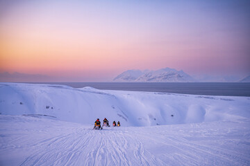 Snowmobile trip, Spitsbergen during winter time, Svalbard - obrazy, fototapety, plakaty