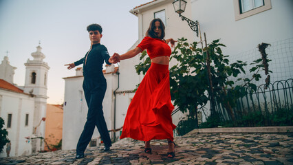 Beautiful Couple Dancing a Latin Dance on the Quiet Street of an Old Town in a City. Sensual Dance...