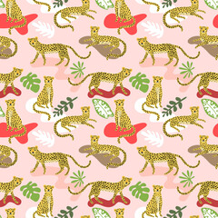 Seamless pattern with cute cartoon leopards and tropical leaves
