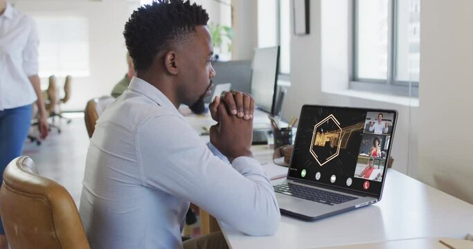 Video of african american man having nft video call on laptop with diverse coworkers