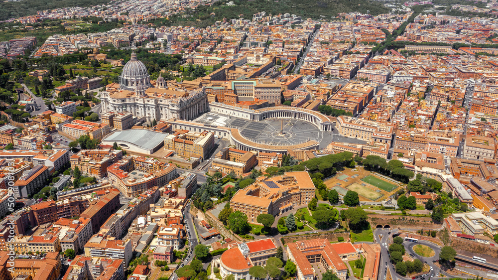Wall mural Aerial view of Papal Basilica of Saint Peter in the Vatican located in Rome, Italy. It is the most largest and important church of Catholicism in the world and the residence of the Pope. - Wall murals
