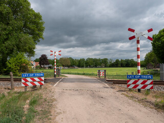 Railroad crossing between Zutphen and Vorden in Gelderland, the Netherlands.