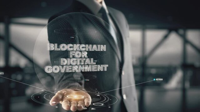 Blockchain for Digital Government with hologram businessman concept