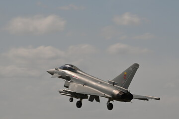 Fototapeta na wymiar Military NATO fighter jet landing on Airfield, UK defence 