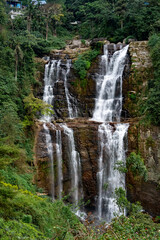 Fototapeta na wymiar Ramboda waterfall in the mountains in Sri Lanka
