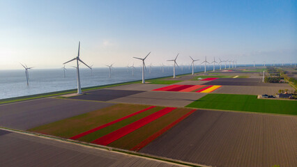 Windmill farm in the ocean Westermeerwind park, windmills isolated at sea on a beautiful bright day...