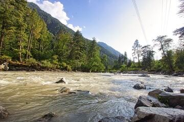 Mountain with turbulent river. Chalal Trek in Kasol, Himachal Pradesh, India