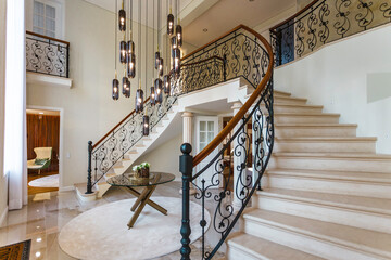 Elegant vintage hallway with iron stairs 
