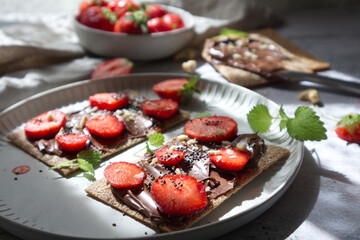 Rye Crispbread with Chocolate Spread and Strawberries