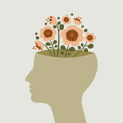 Flowers growing in human head. Concept of mental health, creativity, learning.