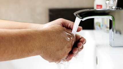 person washing hands