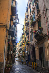 Fototapeta na wymiar Typical narrow street in Naples, Italy
