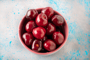 top view cherries in a bowl