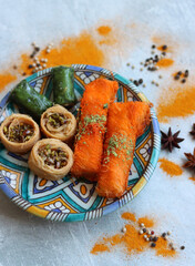 Knafeh traditional Middle Eastern dessert made of cheese, honey syrup and spun pastry. Classic...