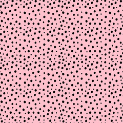 Random small black polka dot background. Print with irregular chaotic points. Vector seamless hand drawn pattern for design, textile, wrapping paper, scrapbooking.