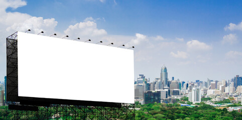 Blank white road billboard with Bangkok cityscape background at day time. Street advertising poster, Side view. The concept of marketing communication to promote or sell idea, copy space for text.