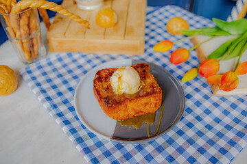 Homemade Honey Toast Serving with Vinilla Ice Cream and Caramel Syrup