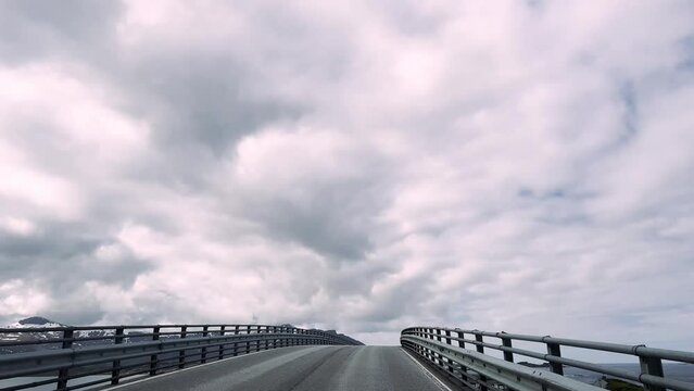 Driving a Car on a Road in Norway Atlantic Ocean Road or the Atlantic Road (Atlanterhavsveien), National Tourist Route along the Atlantic coast