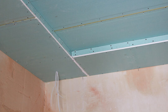 repair of a plasterboard ceiling,installation of sheets of drywall in the room at the corners