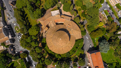 Aerial view of the Basilica of St. Stephen in the Round on the Celian Hill in Rome, Italy. It's a minor basilica and Hungary's national church in Rome. Its peculiarity is a circular roof.
