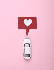 Like icon with toy car on pink background. Rating, followers feedback. Top view