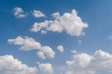 Naklejka na ściany i meble Beautiful white clouds with blue sky background.