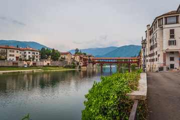 Fototapeta na wymiar View of the Alpini Bridge with the Brenta River in Bassano del Grappa, Vicenza, Veneto, Italy, Europe