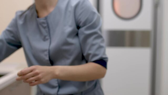 Professional doctor wash hands before surgery operation, clean the dirt. In sterile operating room.