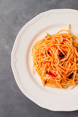 Pasta with tomato sauce and cheese, Italian traditional dish, close-up, no people,
