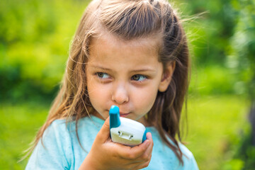 Small girl,kid play in walkie-talkie.Walkie Talkies with channels.Game of detectives, spies.Children talk,say messages at distance.Communication with parents in forest,park,hike.Finding lost people