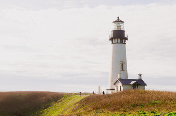 Fototapeta na wymiar Yaquina Head Lighthouse on the Pacific Coast in Oregon