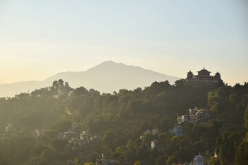 View to a misty monastery in a forest in Kathmandu, Nepal