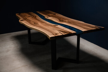 large rectangular table made of unedged wood and oxide resin - obrazy, fototapety, plakaty