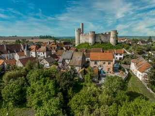 Fototapeta na wymiar Aerial view of Billy castle in Central France with donjon, four semi circle towers and fortified gate house on a hilltop