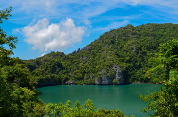 Fototapeta na wymiar view on the emerald lake hidden in green hills mountains, Thailand nature reserve, Blue lagoon touristic place landmark 