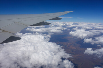 Fototapeta na wymiar beautiful views from above through aircraft window 